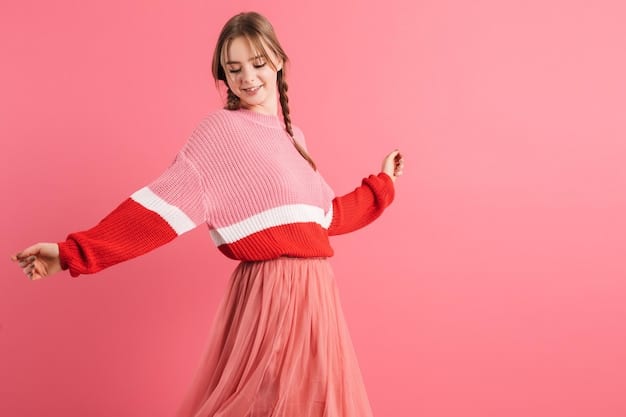 A model wearing an oversized pastel pink sweater paired with a white pleated skirt and white sneakers. The background is a pastel-colored wall with cute, minimalist decorations, emphasizing the soft and youthful aesthetic of dorama fashion.