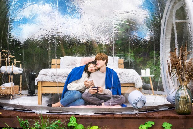 A split-screen image showing a scene from a popular K-drama featuring a romantic encounter on one side and a similar scene from an American TV show inspired by K-dramas on the other. Both scenes highlight dramatic lighting and emotional facial expressions.