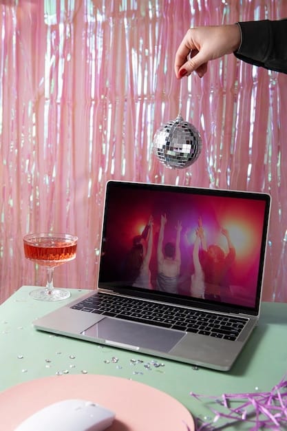 A close-up shot of a laptop screen displaying a live K-Pop concert stream. The chat window is visible, filled with messages from fans all over the world.