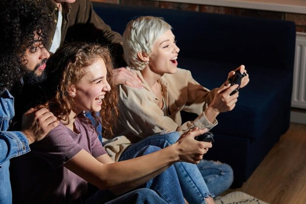 A group of friends gathered around a TV, enthusiastically participating in a live poll during a K-Drama streaming event. They are all holding smartphones and debating their responses.